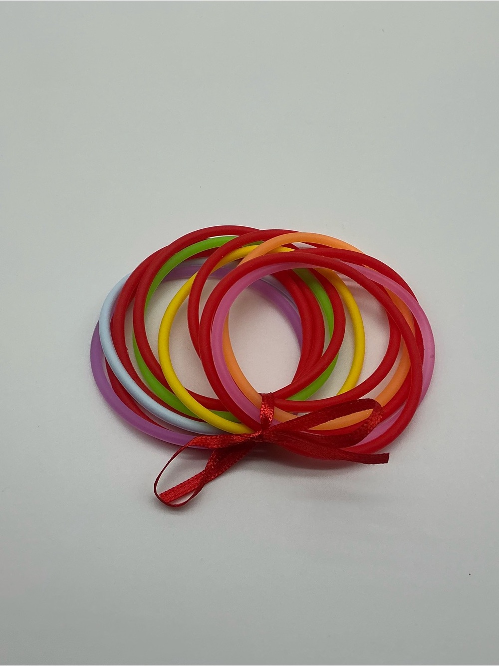 Set of 12 Red and Pastel Rainbow Colored Jelly Bracelets